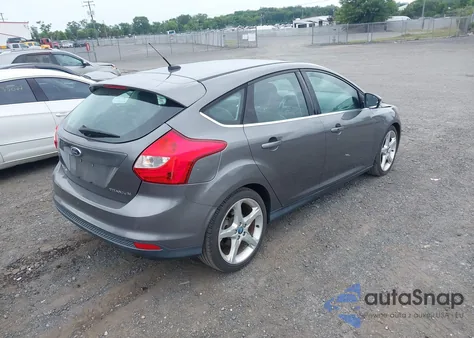 2012 Ford Focus Titanium z USA, uszkodzony, nr VIN 1FAHP3N21CL433734